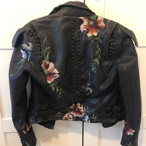 Leather jacket with flower detail